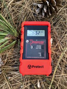 This is an Inspector Alert Geiger counter on the forest floor, N. California